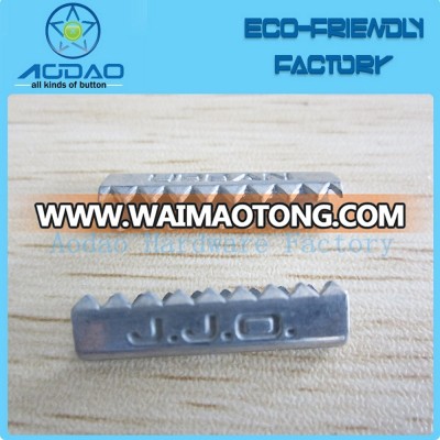 Metal cord end clips for bags with logo